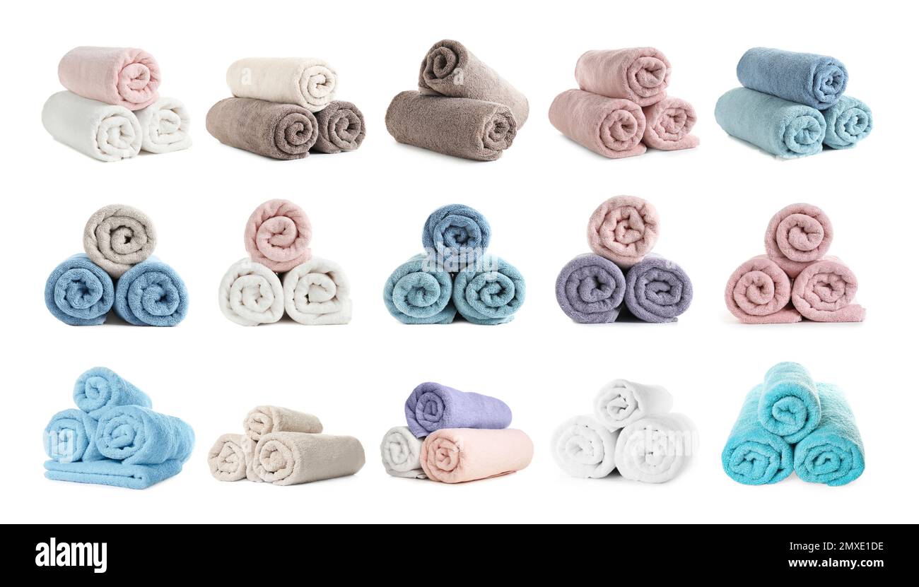 Set of rolled soft terry towels on white background Stock Photo