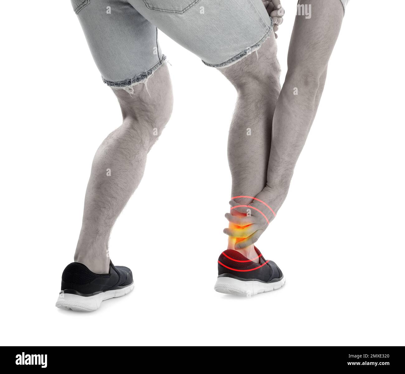 Young man suffering from leg pain hi-res stock photography and images ...