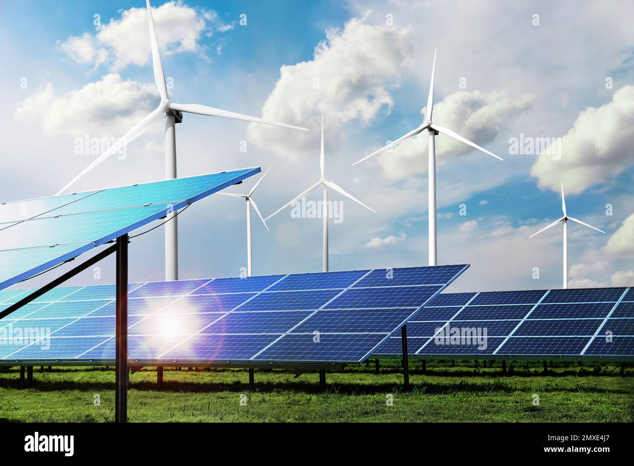 Solar panels and wind turbines installed outdoors. Alternative energy ...