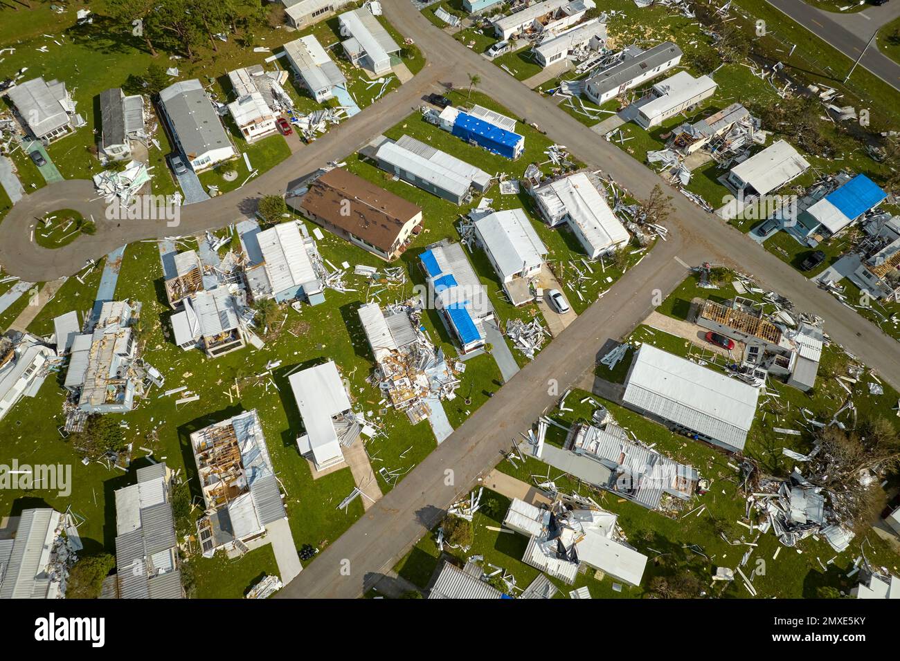 Badly damaged mobile homes after hurricane Ian in Florida residential
