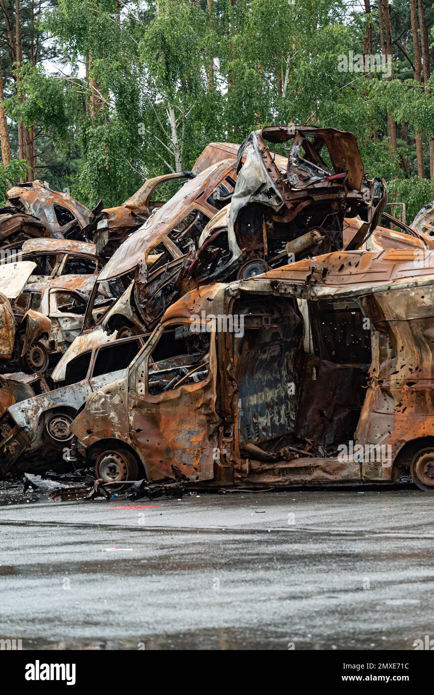 Shot and burned cars during the war in Ukraine Stock Photo
