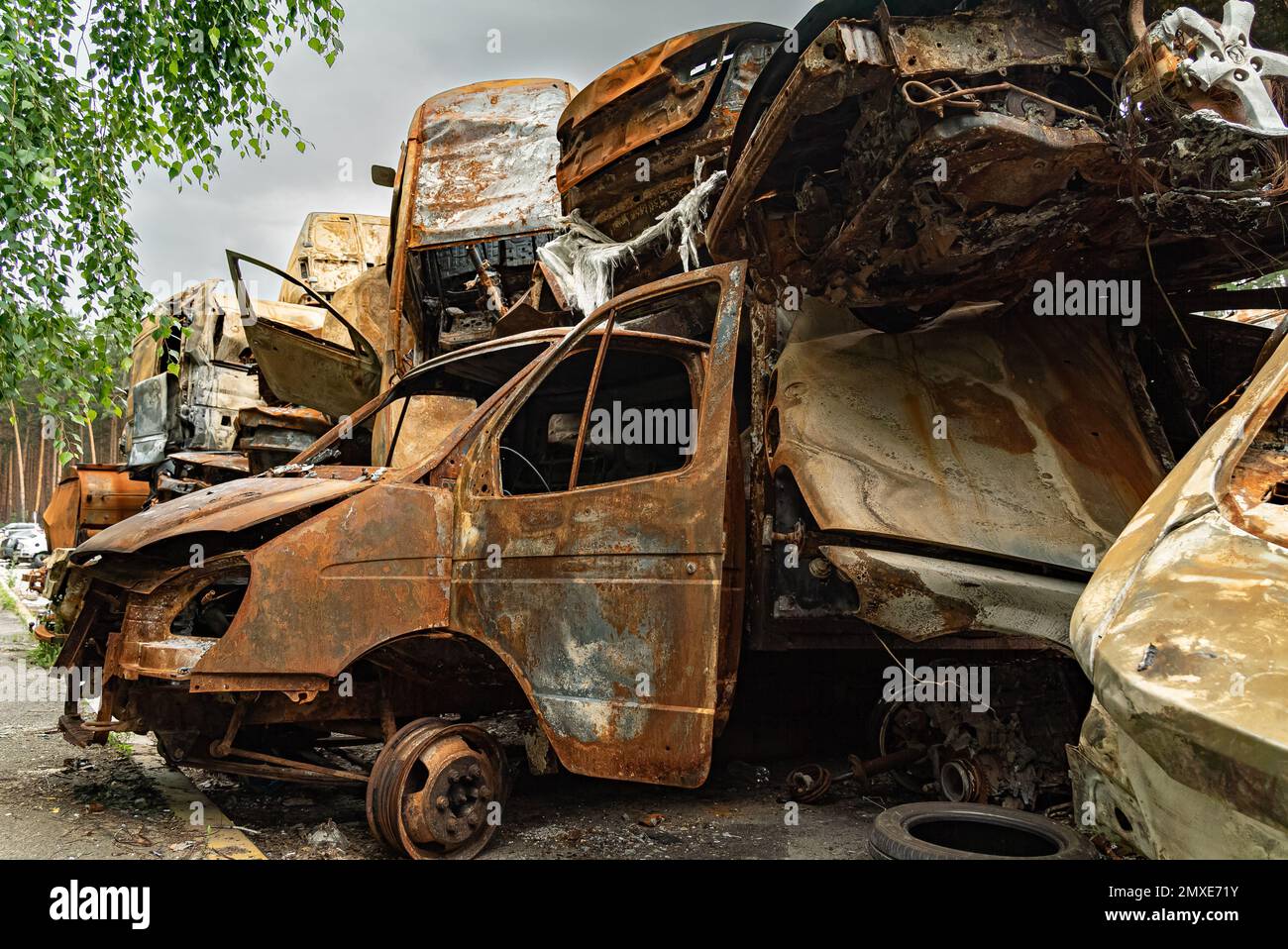 Shot and burned cars during the war in Ukraine Stock Photo