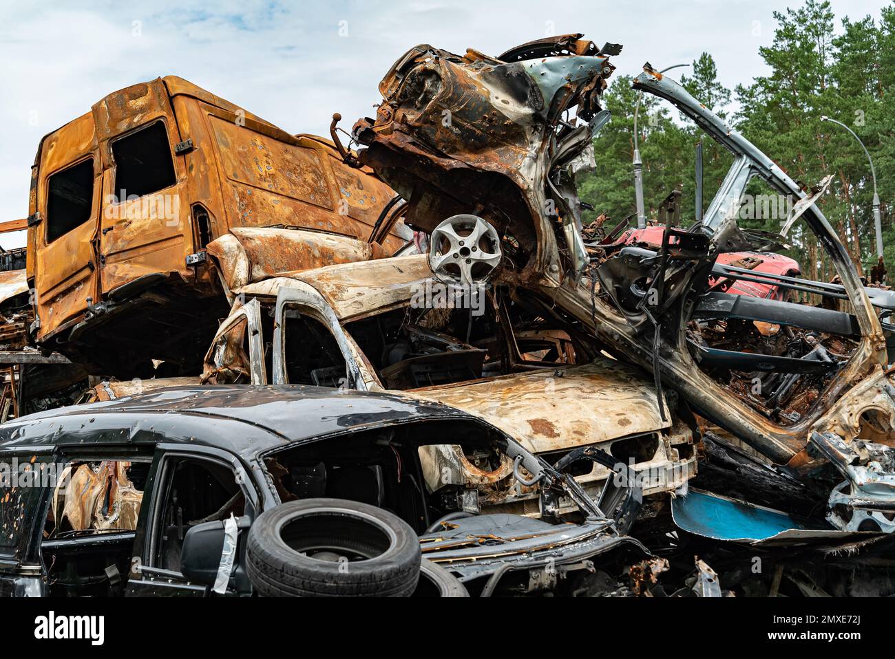 Consequences of the war in Ukraine - destroyed cars in Irpin, Bucha district. Stock Photo