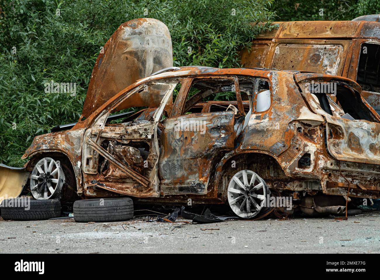 Dump of war-destroyed cars in Ukraine Stock Photo