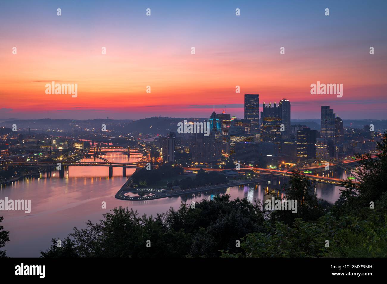 Pittsburgh, Pennsylvania, USA city skyline on the three rivers at dawn. Stock Photo