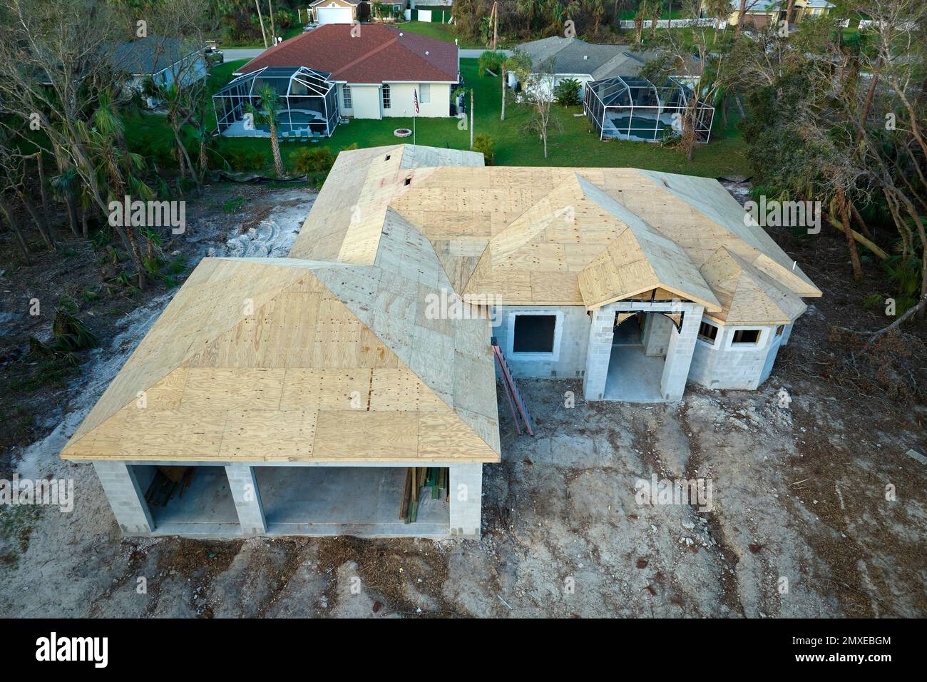 Aerial view of residential private home with wooden roofing structure