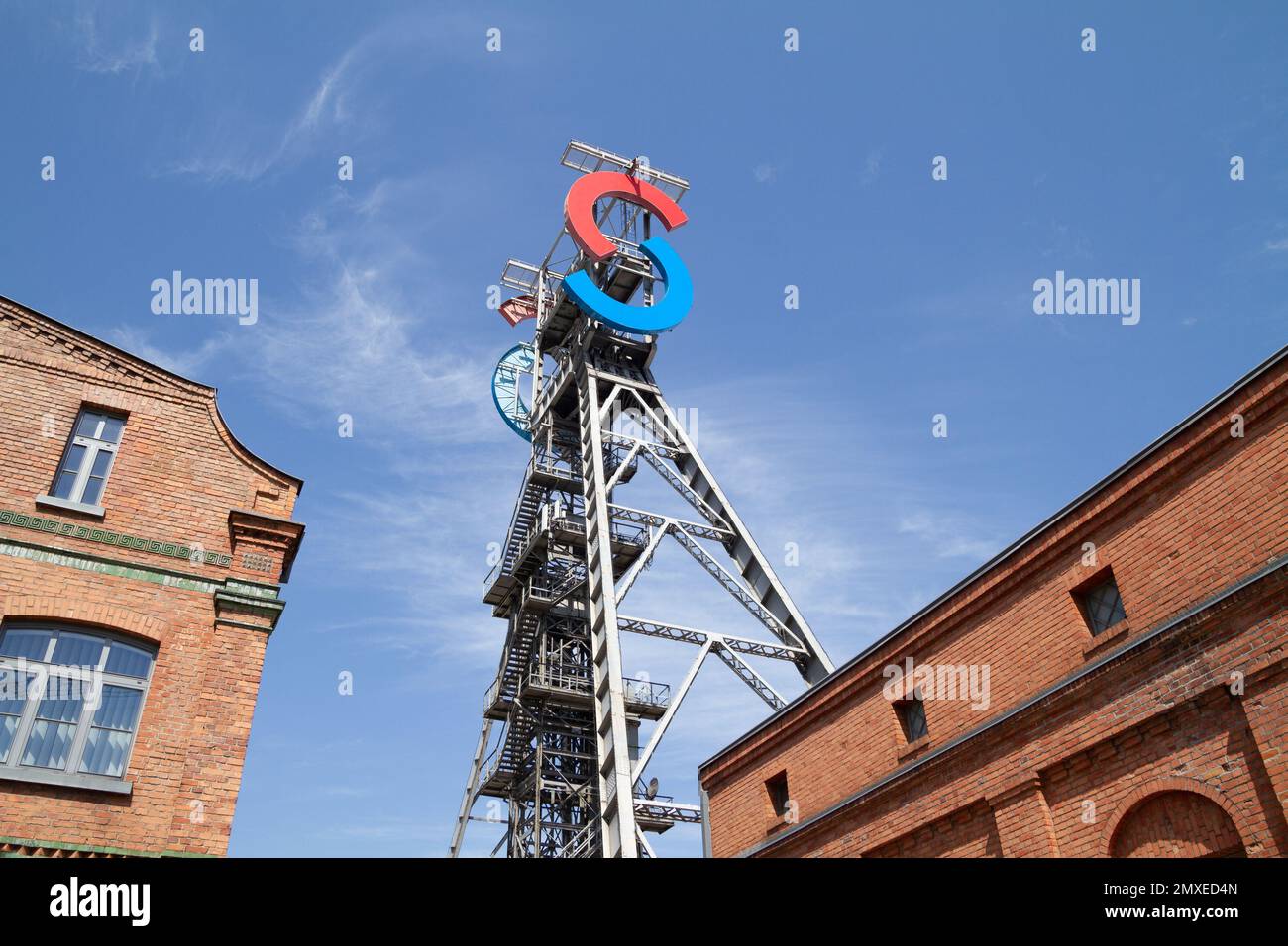 Silesia City Center shopping mall in Katowice, Poland. Located on site of former coal mine KWK Gottwald. SCC logo sign at antique tower shaft Jerzy. Stock Photo