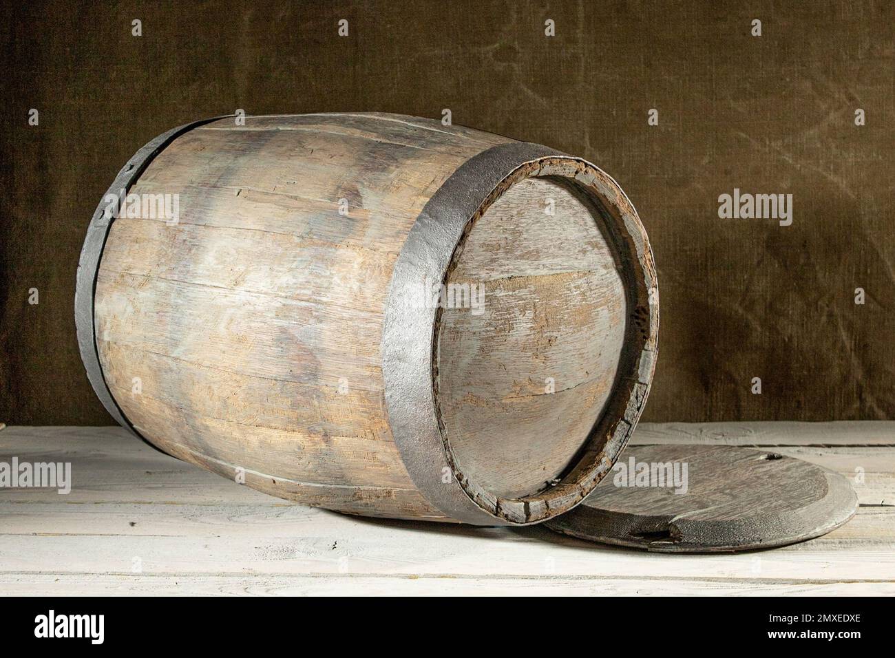 an old oak wine barrel lying on its side Stock Photo