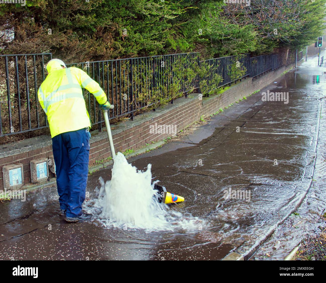 Glasgow, Scotland, UK 3rd February, 2023. fire hydrants targeted by vandals giving   Water pours from a leak in drumchapel as Scottish water tries to stem it. Credit Gerard Ferry/Alamy Live News Stock Photo