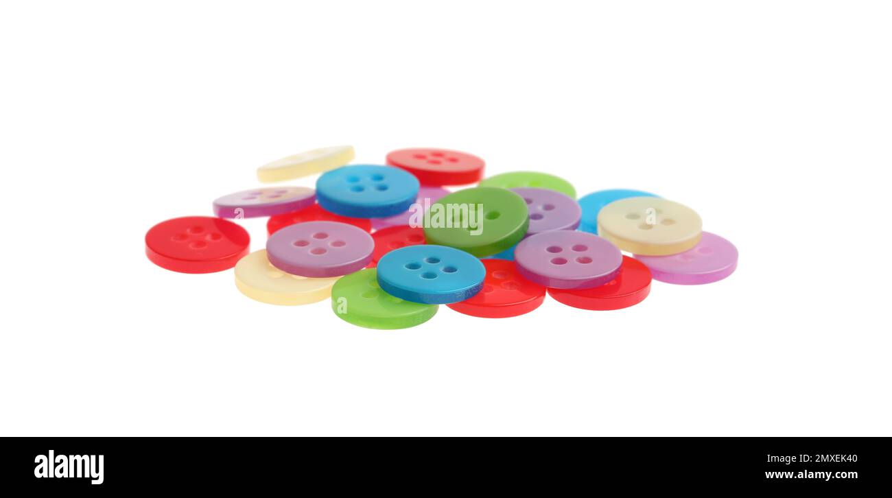 Many colorful sewing buttons on white background Stock Photo - Alamy