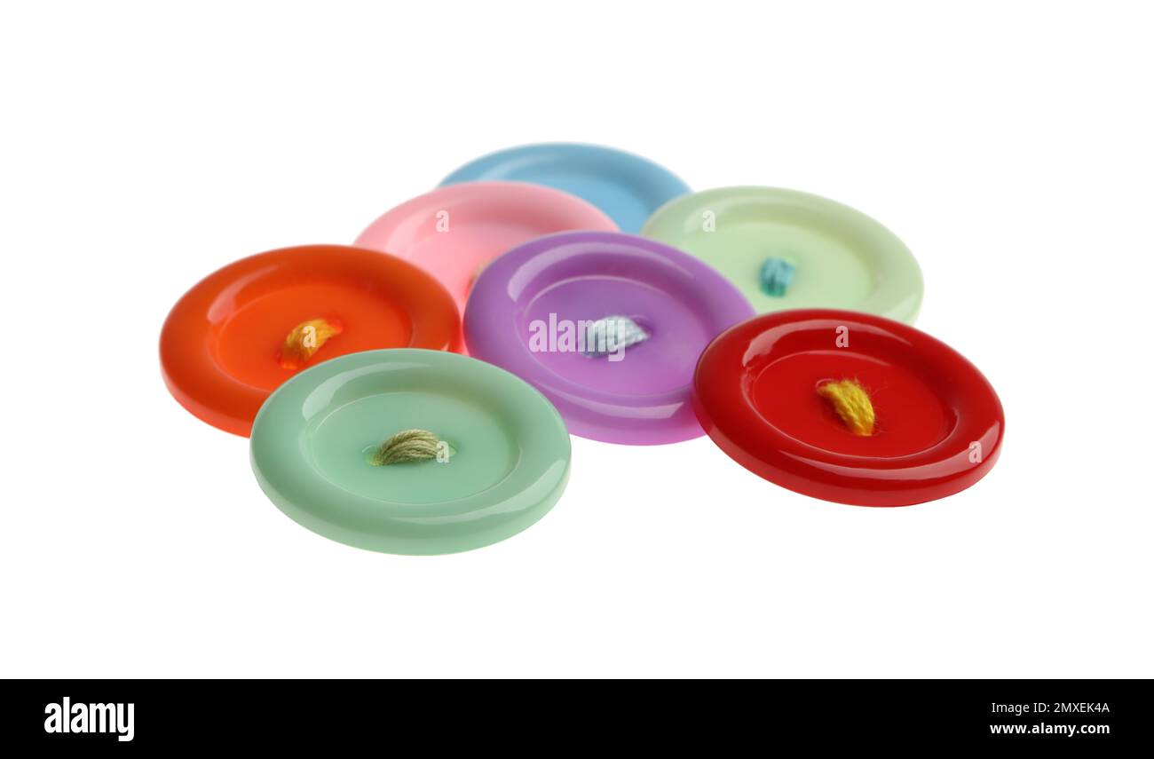 Many colorful sewing buttons on white background Stock Photo - Alamy