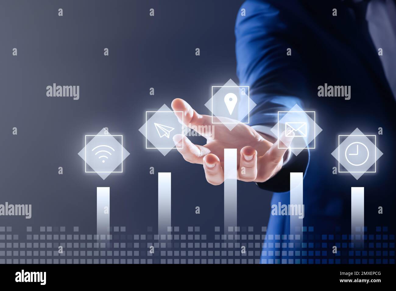Businessman demonstrating icons of core values on grey background ...