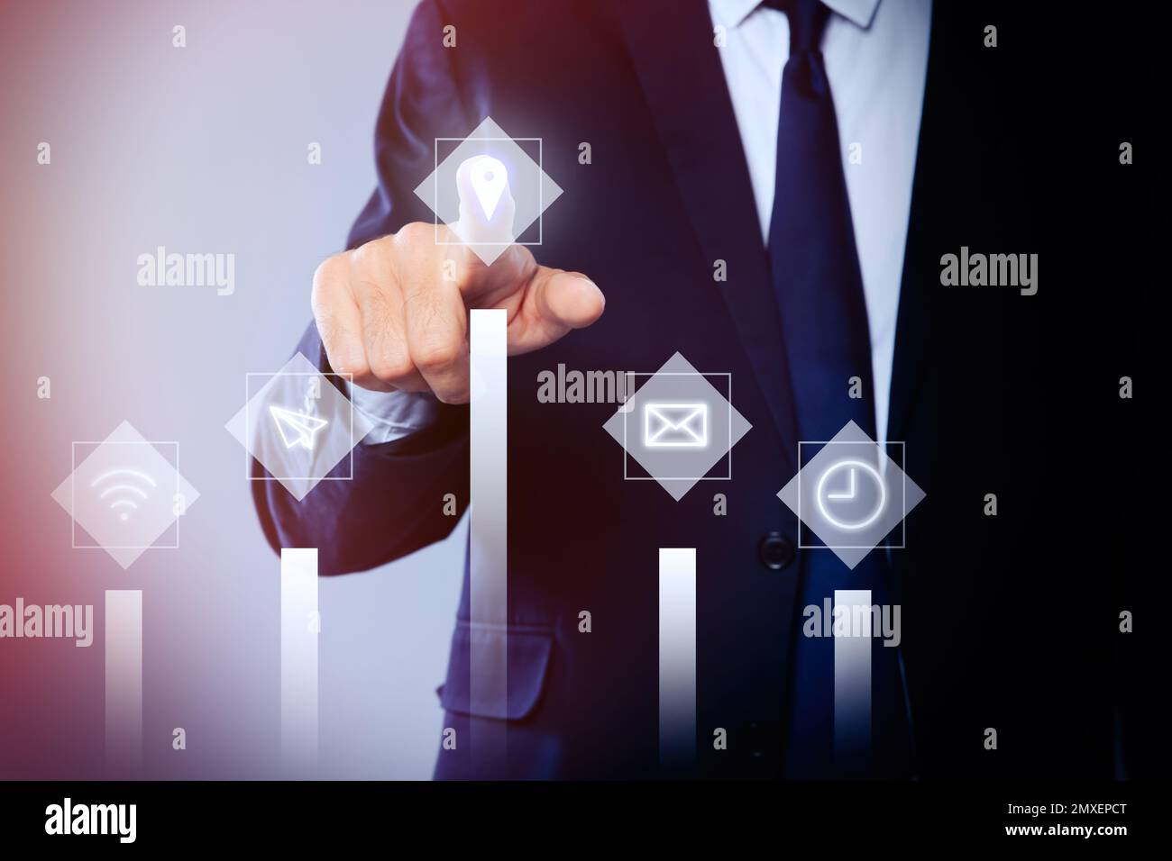 Core values concept. Businessman pointing at icon on virtual screen Stock Photo