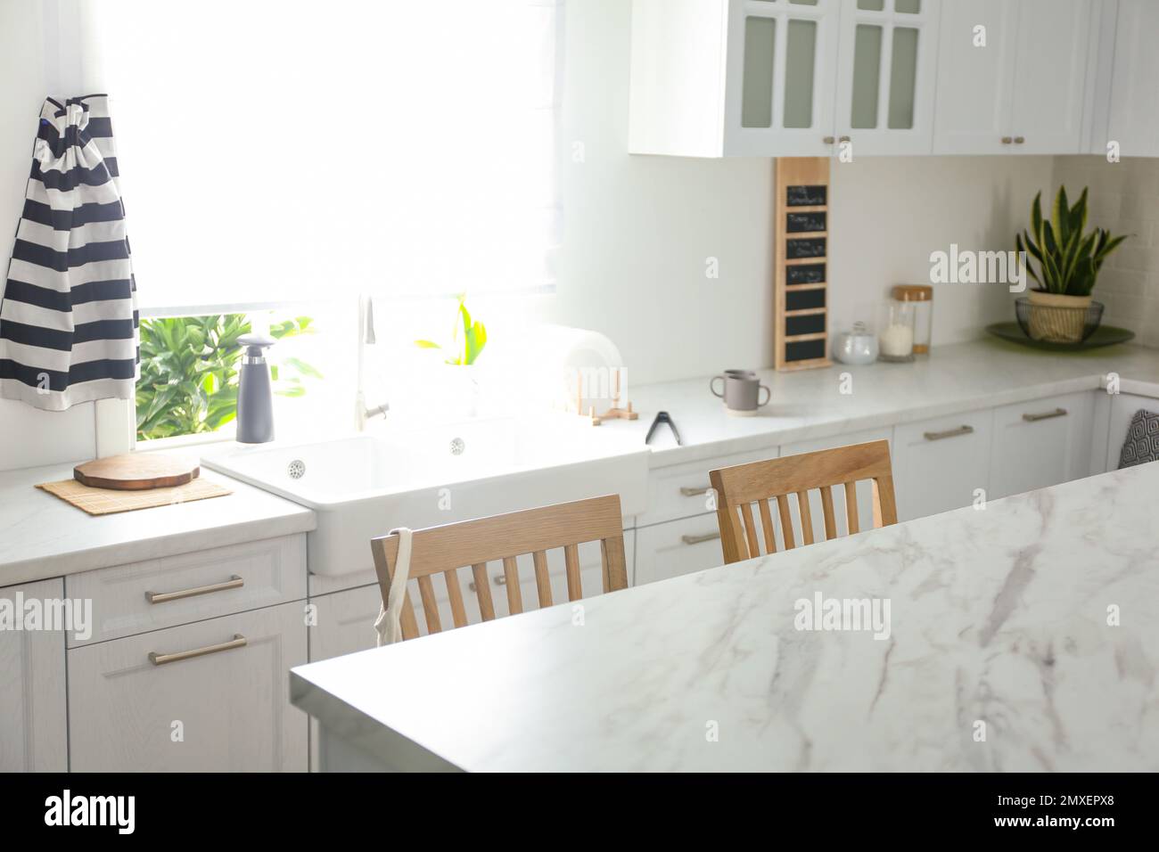 Modern kitchen interior with stylish marble table Stock Photo