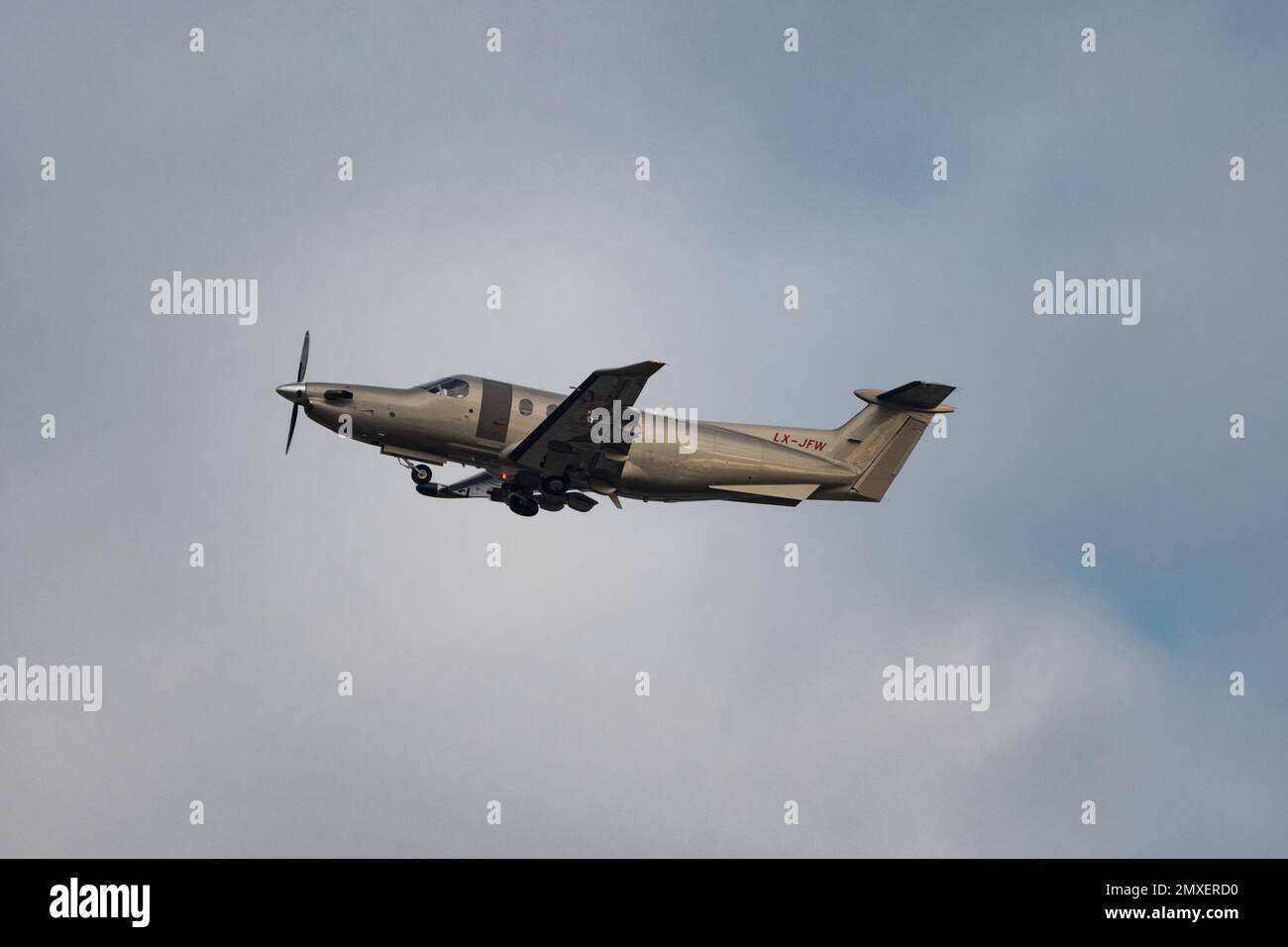 Zurich, Switzerland, January 20, 2023 Pilatus PC-12NG propeller plane taking off from runway 28 Stock Photo