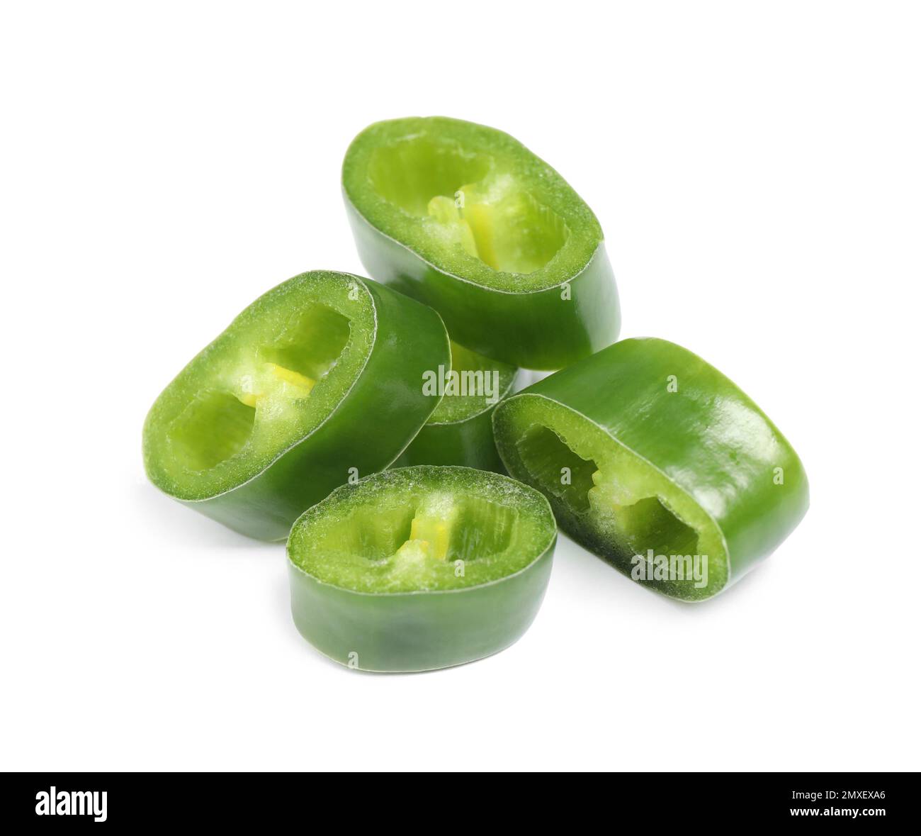Cut green hot chili pepper on white background Stock Photo - Alamy