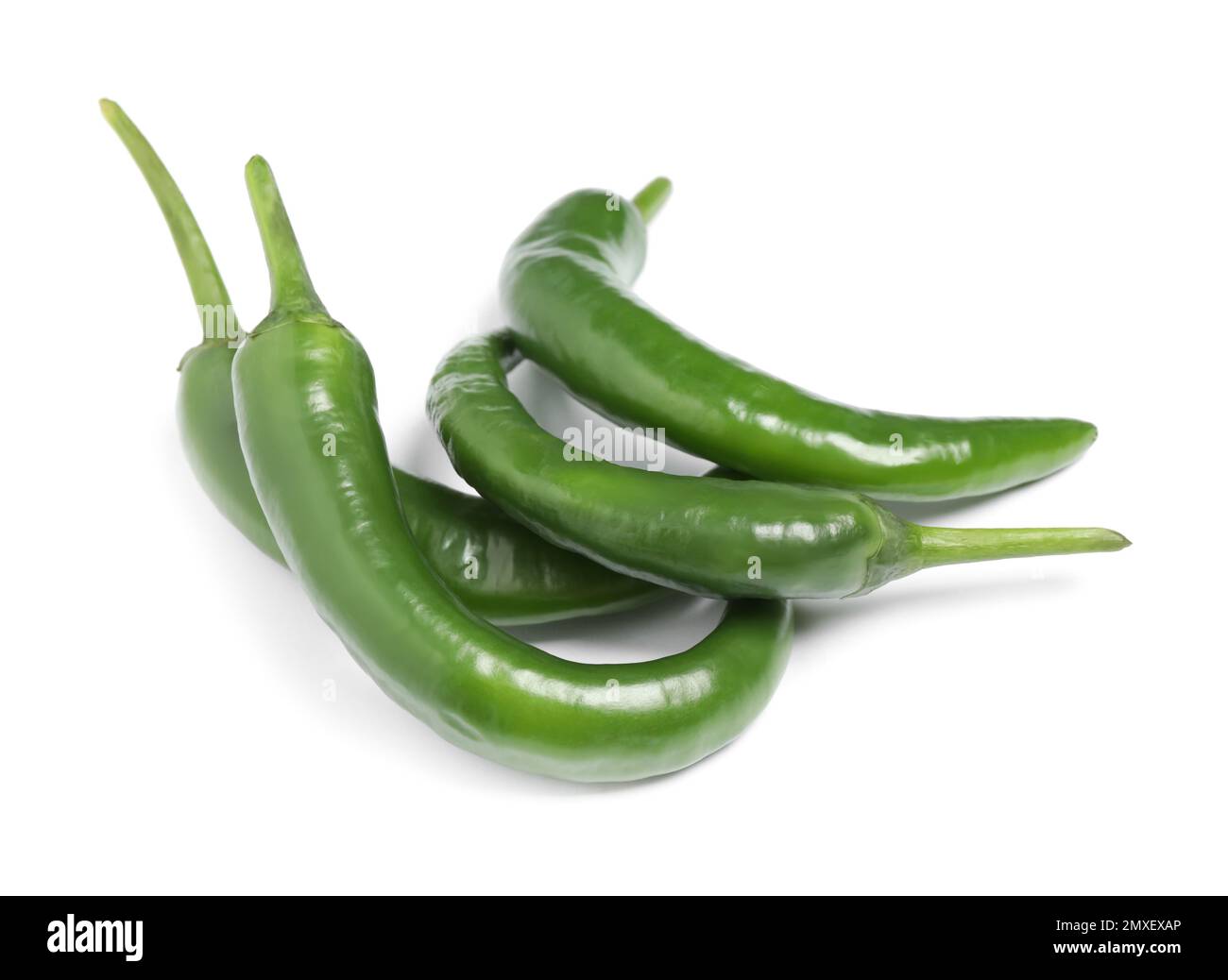 Green hot chili peppers on white background Stock Photo - Alamy