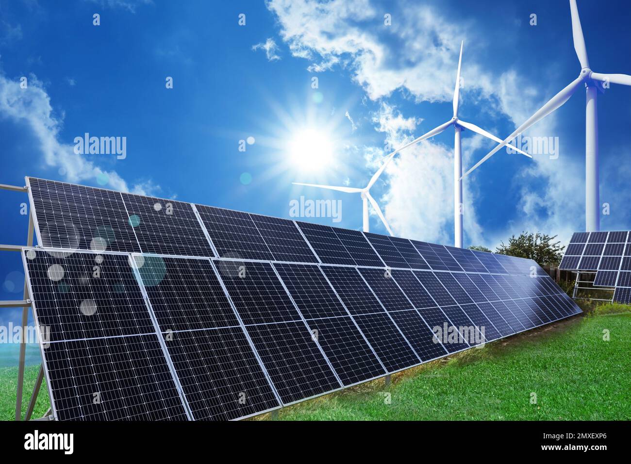 Solar panels and wind turbines installed outdoors. Alternative energy ...