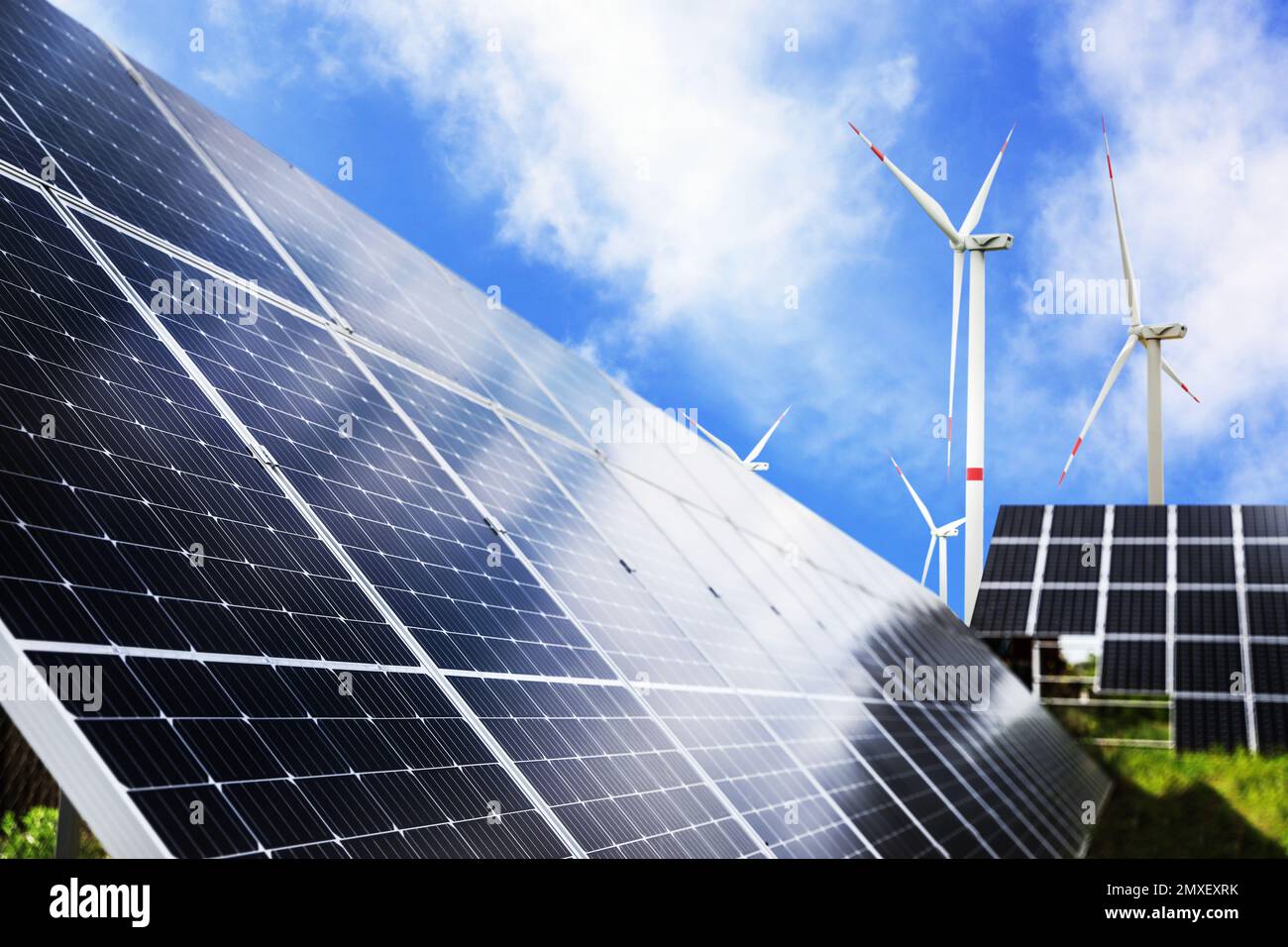Solar panels and wind turbines installed outdoors. Alternative energy ...