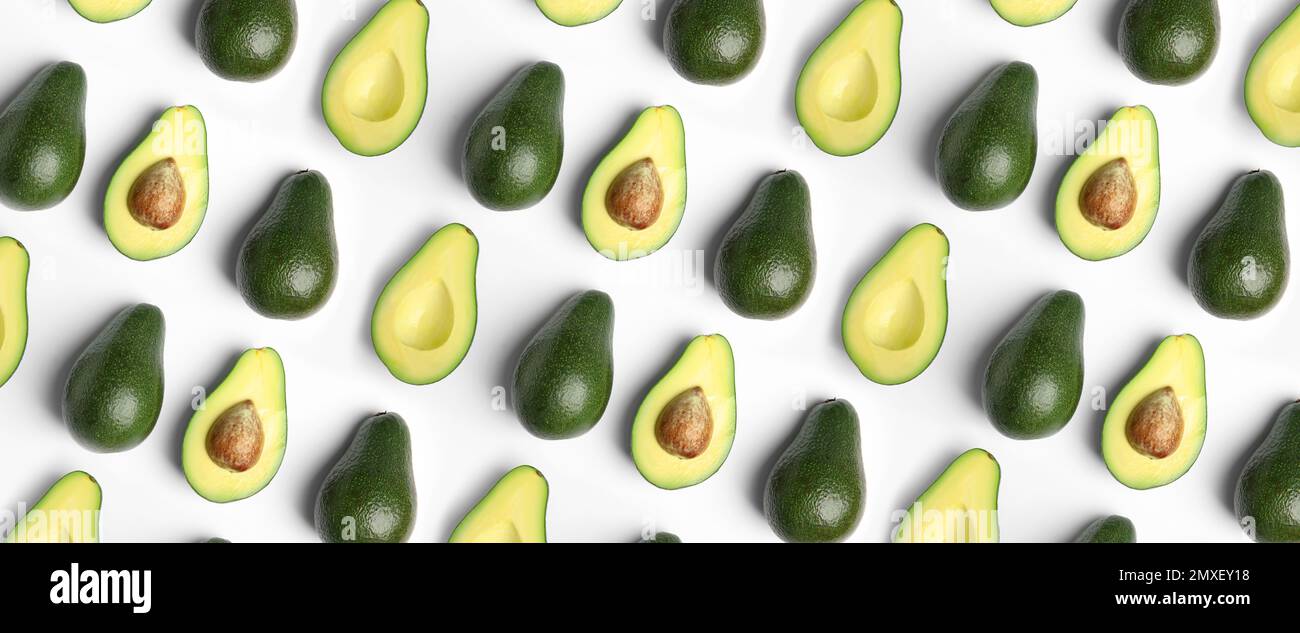 Flat lay composition with fresh ripe avocados on white background ...