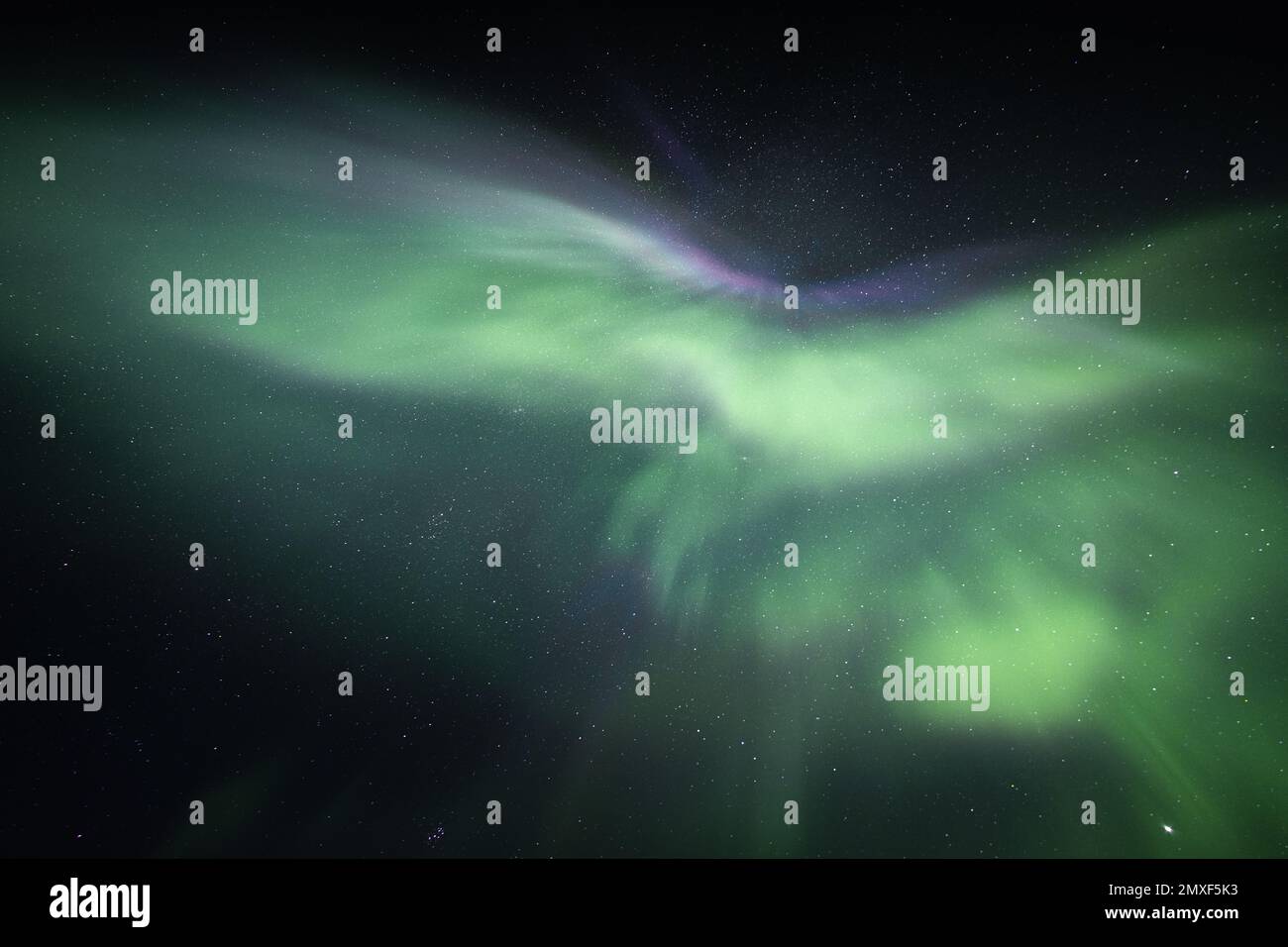 The scenic Northern Lights against the starry sky Stock Photo - Alamy