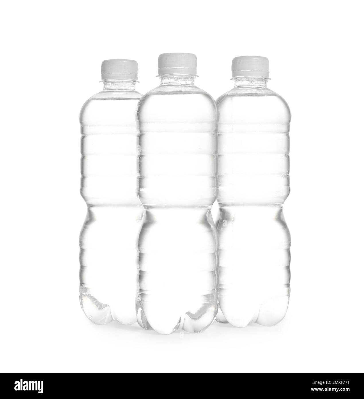 Plastic bottles with pure water on white background Stock Photo - Alamy
