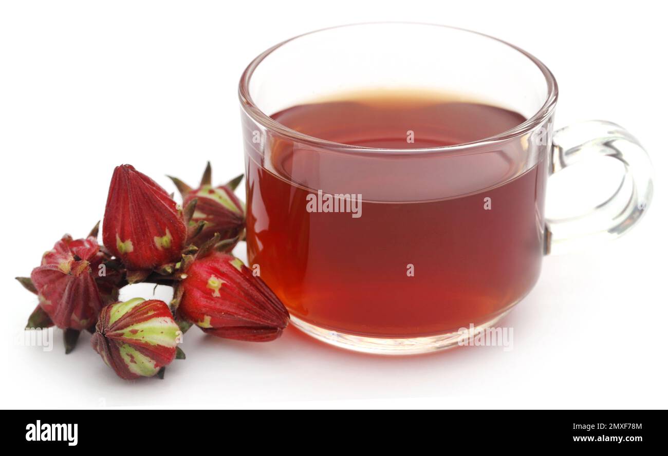 Roselle tea in a transparent cup with fresh organic fruits Stock Photo