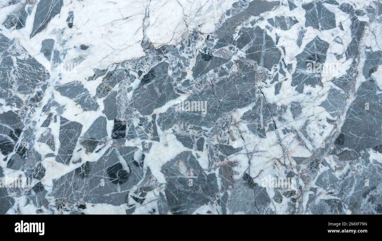 Gray and white rough grainy stone texture background. Stock Photo