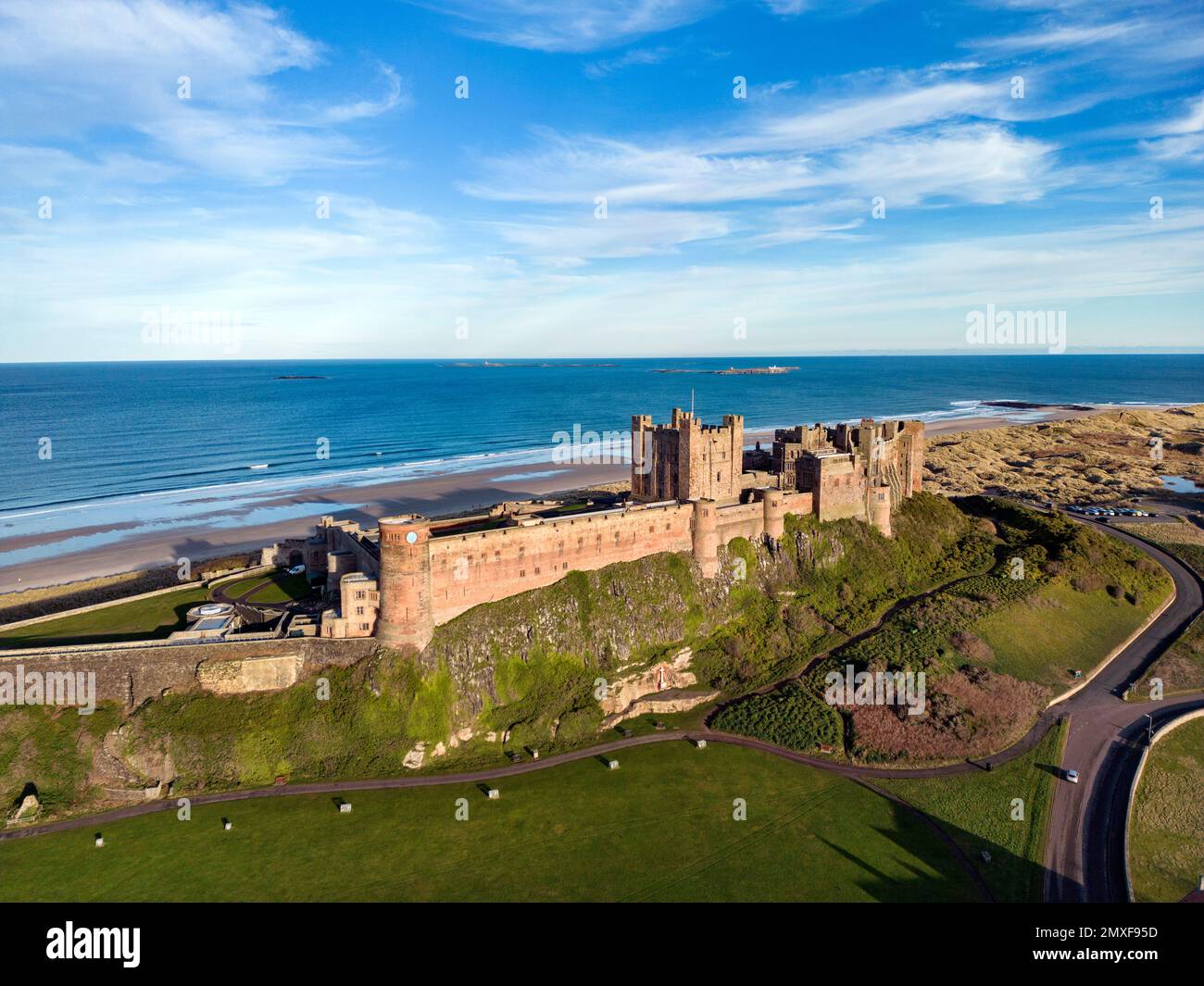 Aerial view of Bamburgh Castle in Northumberland on the northeast coast ...