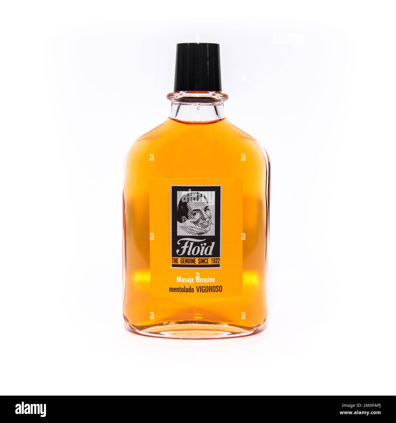 An after shave liquid in a bottle on a white background Stock Photo Alamy