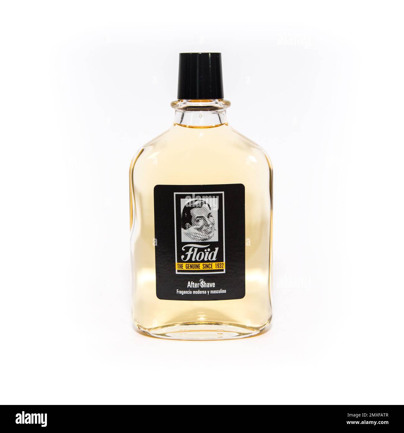 An after shave liquid in a bottle on a white background Stock Photo Alamy