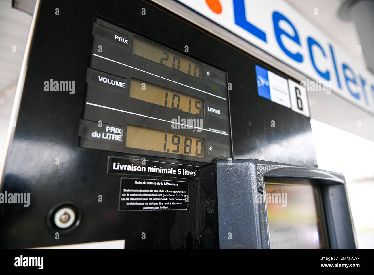 Sp95 Gas Illustration picture shows the price after a person using a petrol pump ...