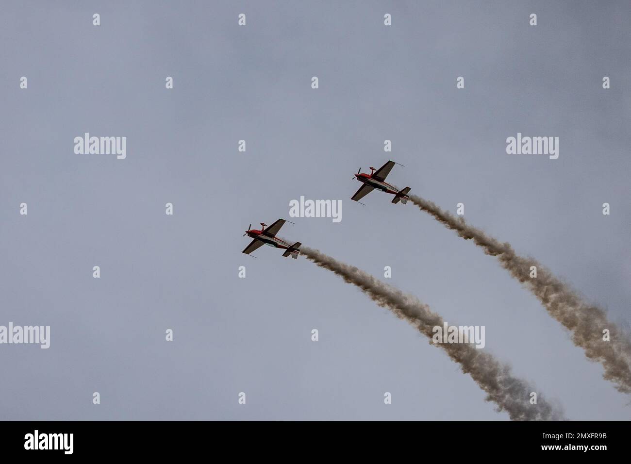Two Wings Over Houston, Stunt planes inverted Stock Photo Alamy