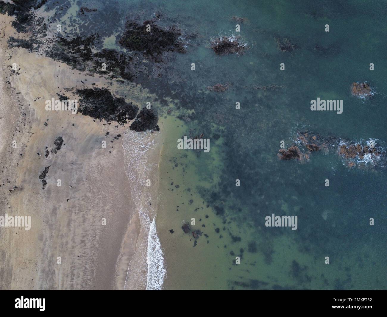 An aerial view of a magnificent and idyllic sea coast in summer on ...