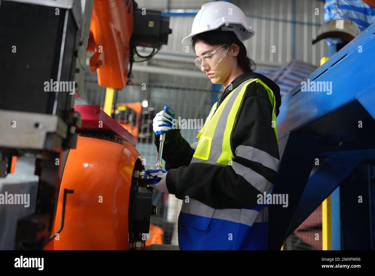 Engineer check and control welding robotics automatic arms machine in ...