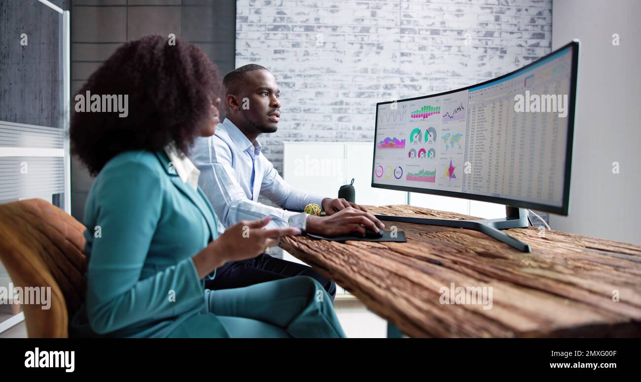 African American Business Data Analyst Using Analytics Software Stock Photo