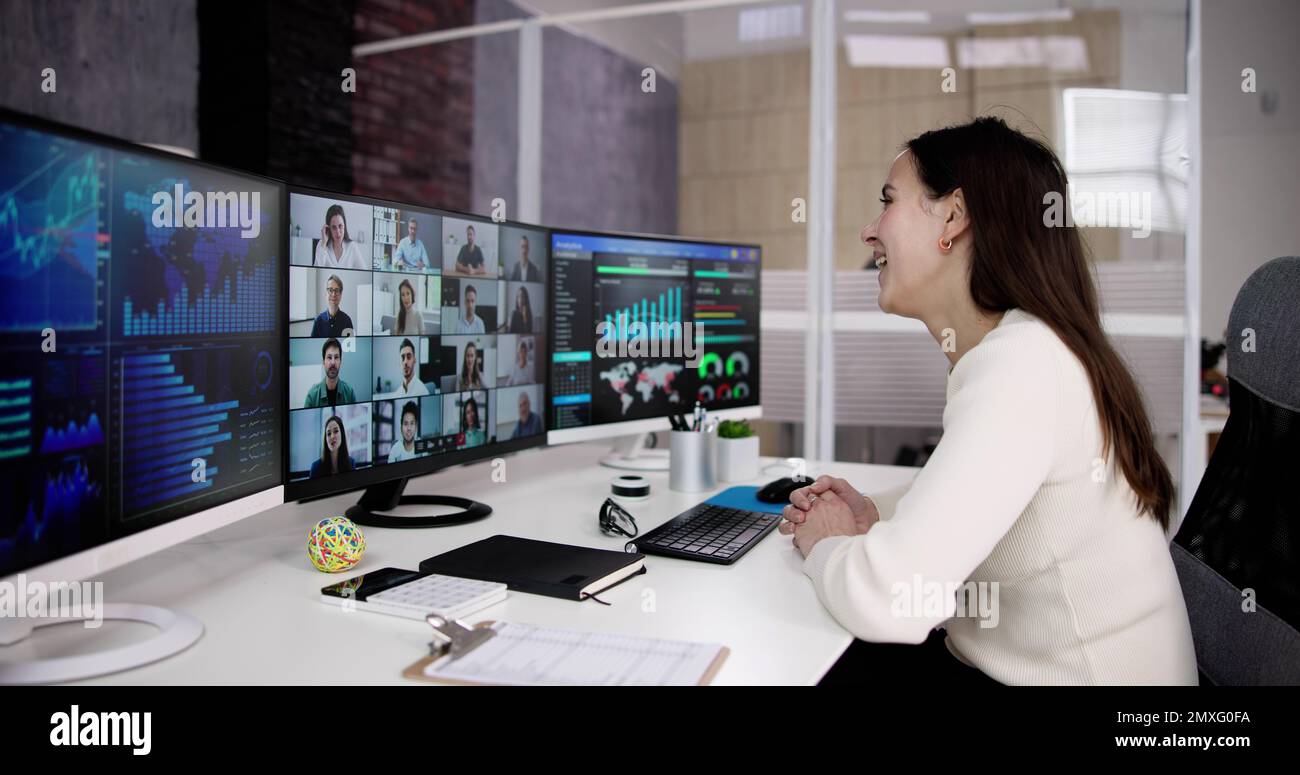 Watching Video Conference Business Webinar On Computer Stock Photo