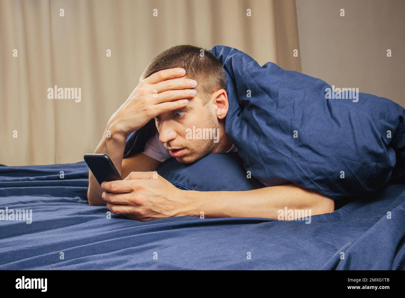 Upset confused young man holding mobile phone, having mobile phone problems  or missed call, frustrated angry student reading bad news in message, look  Stock Photo - Alamy