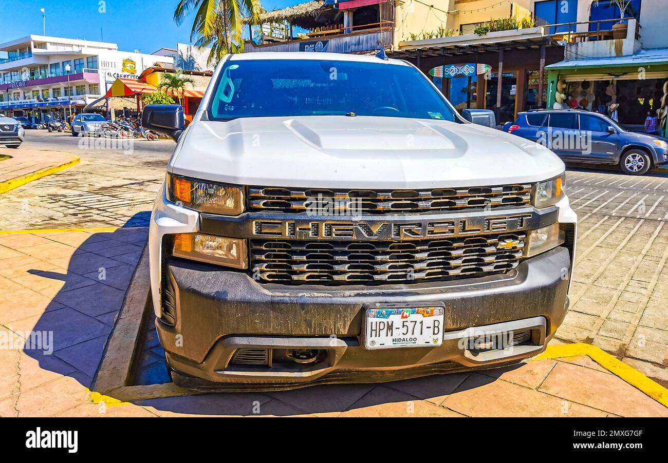Puerto Escondido Oaxaca Mexico 2022 Various Mexican pickup trucks cars