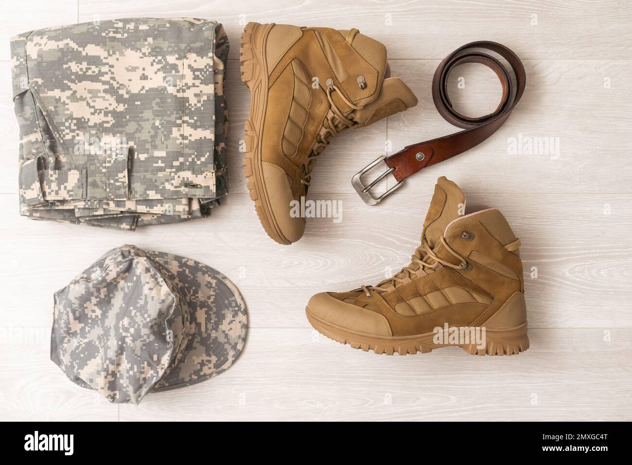 military camouflage uniforms and boots Stock Photo Alamy