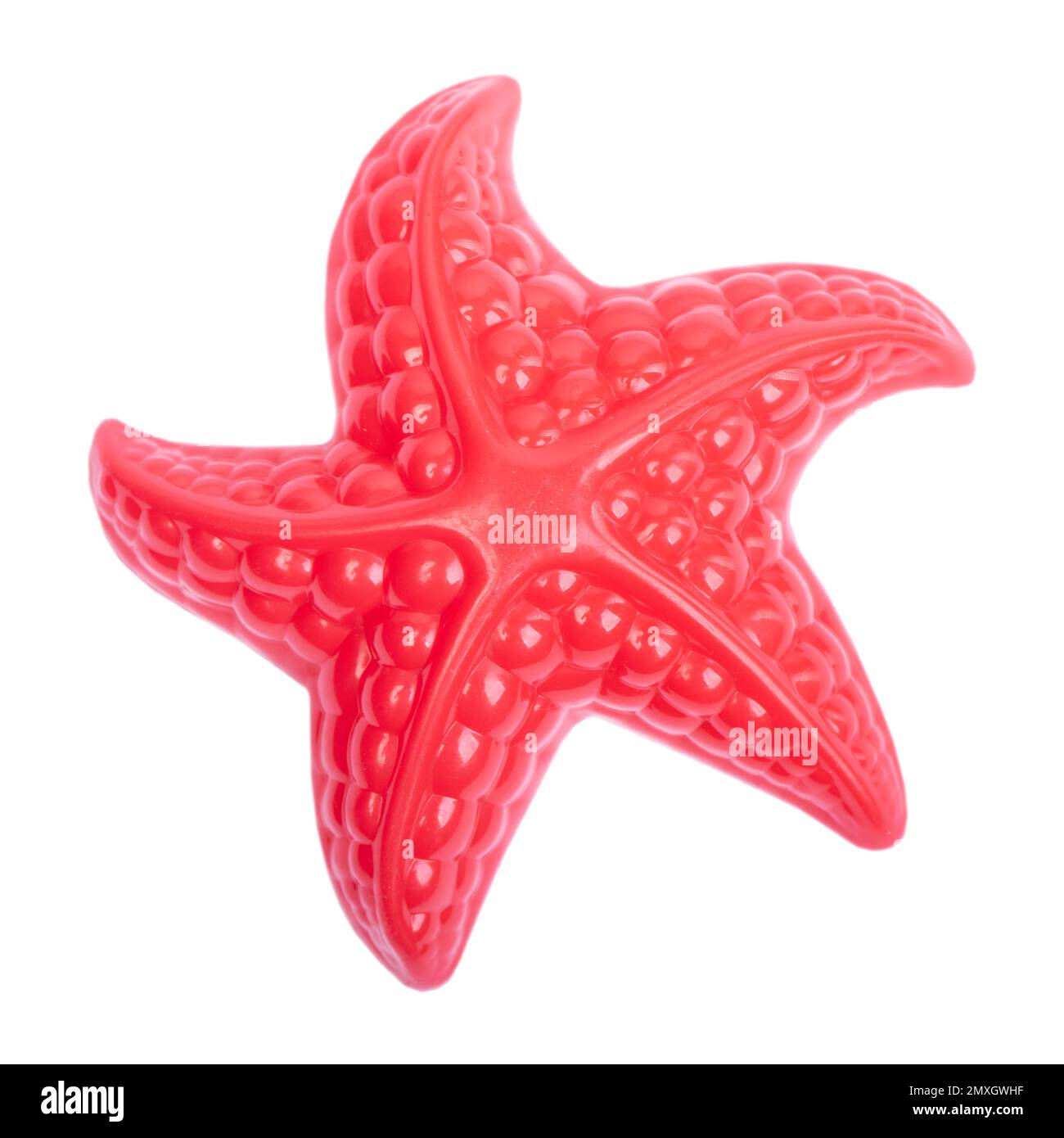 Red plastic starfish isolated on white background Stock Photo