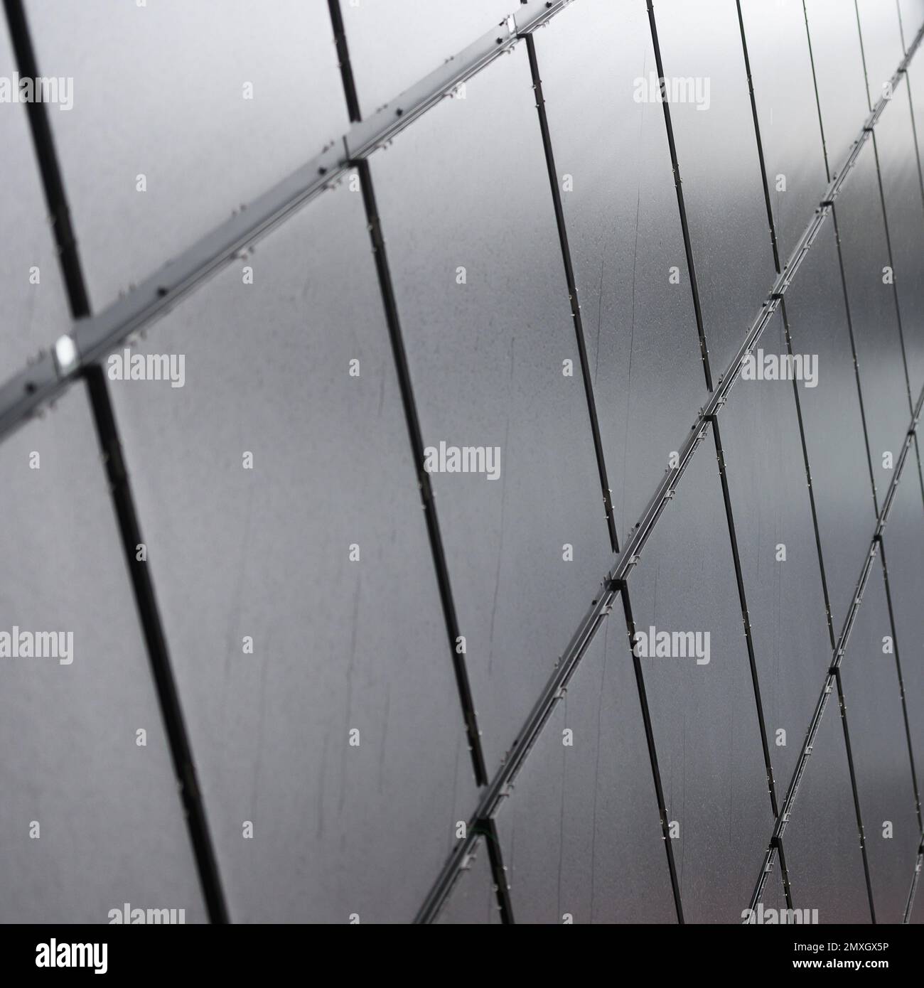 Metal wall with abstract square shape design, selective focus Stock Photo