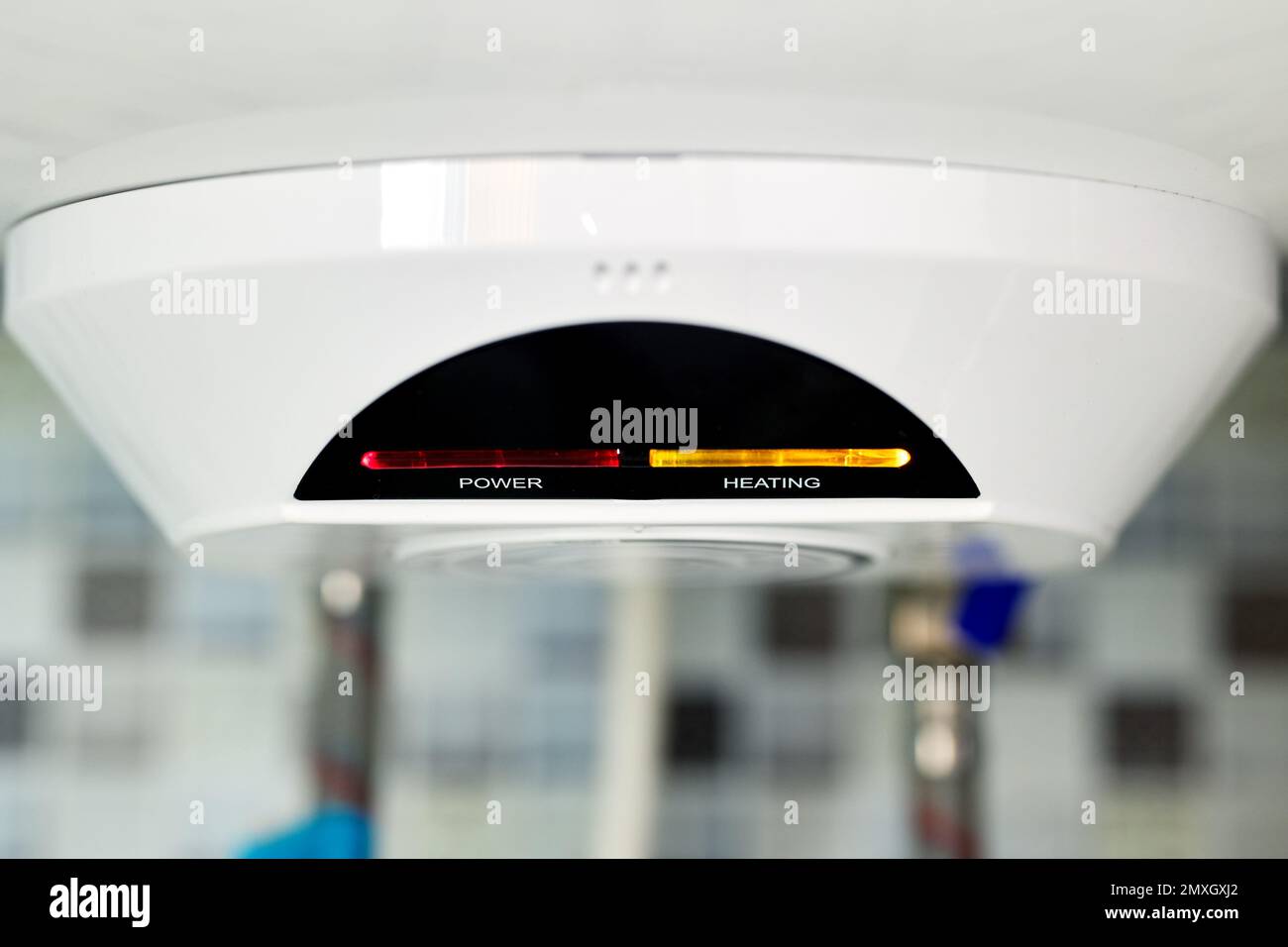 Power and heating indicators on panel of domestic water heater Stock