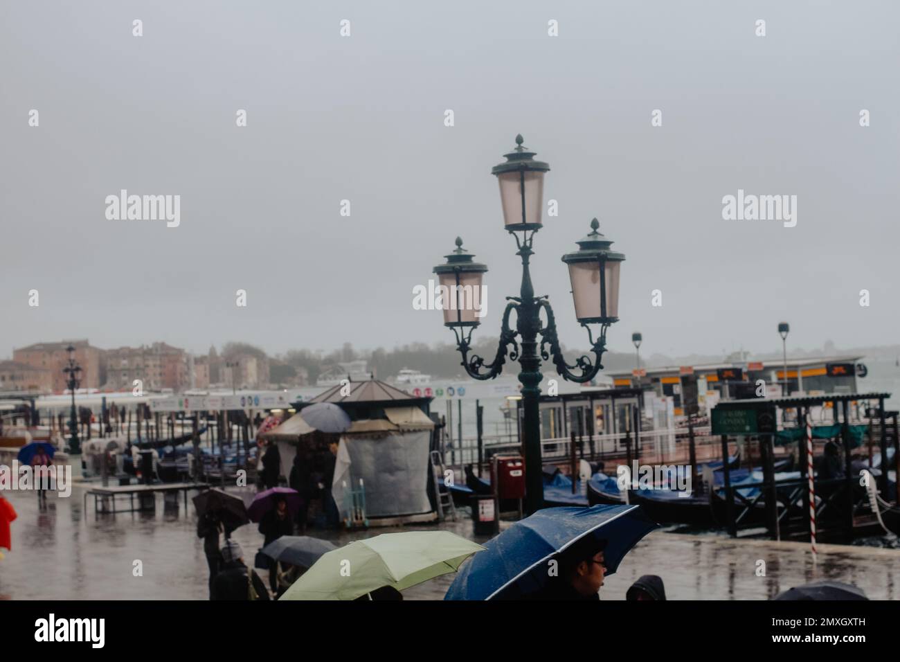 STRASBOURG, FRANCE - SEP 21, 2014: White Mercedes-Benz E Class taxi parked  on a rainy day in center of Strasbourg, place Kleber next to cafe Stock  Photo - Alamy