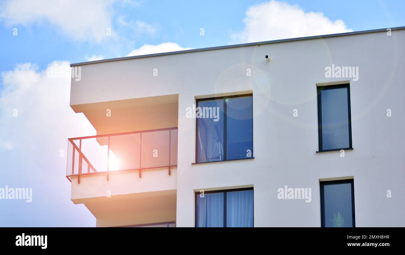 Modern apartment buildings on a sunny day with a blue sky. Facade of a ...