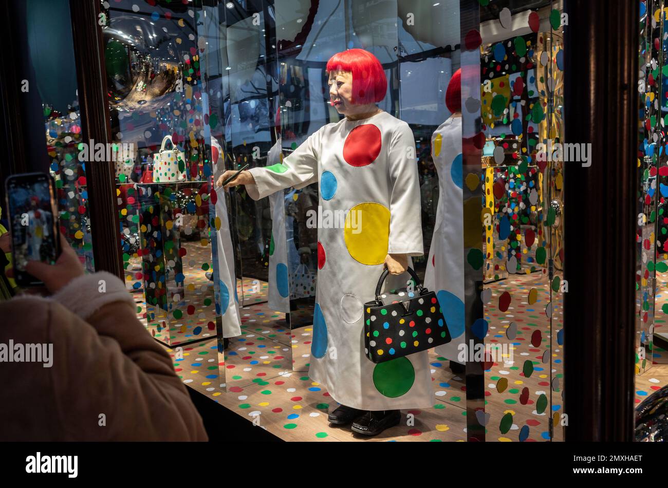 Jeff Moore - A 50-foot statue of the Japanese artist Yayoi Kasuma stands  outside Harrods, clutching her LV bag and 'painting' dots for the launch Lo  Stock Photo - Alamy