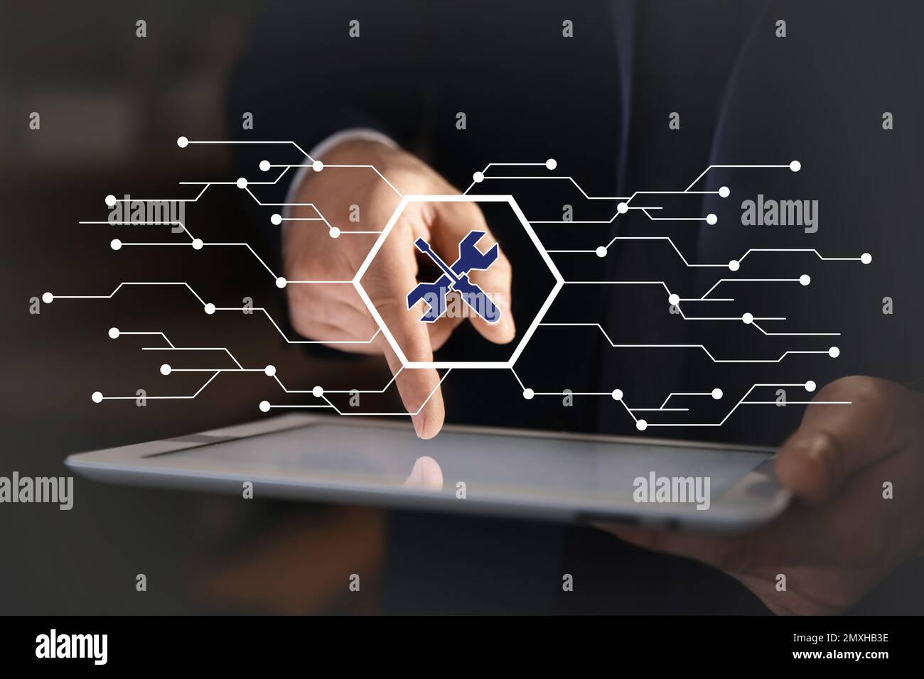Man using tablet at workplace, closeup. Technical support Stock Photo