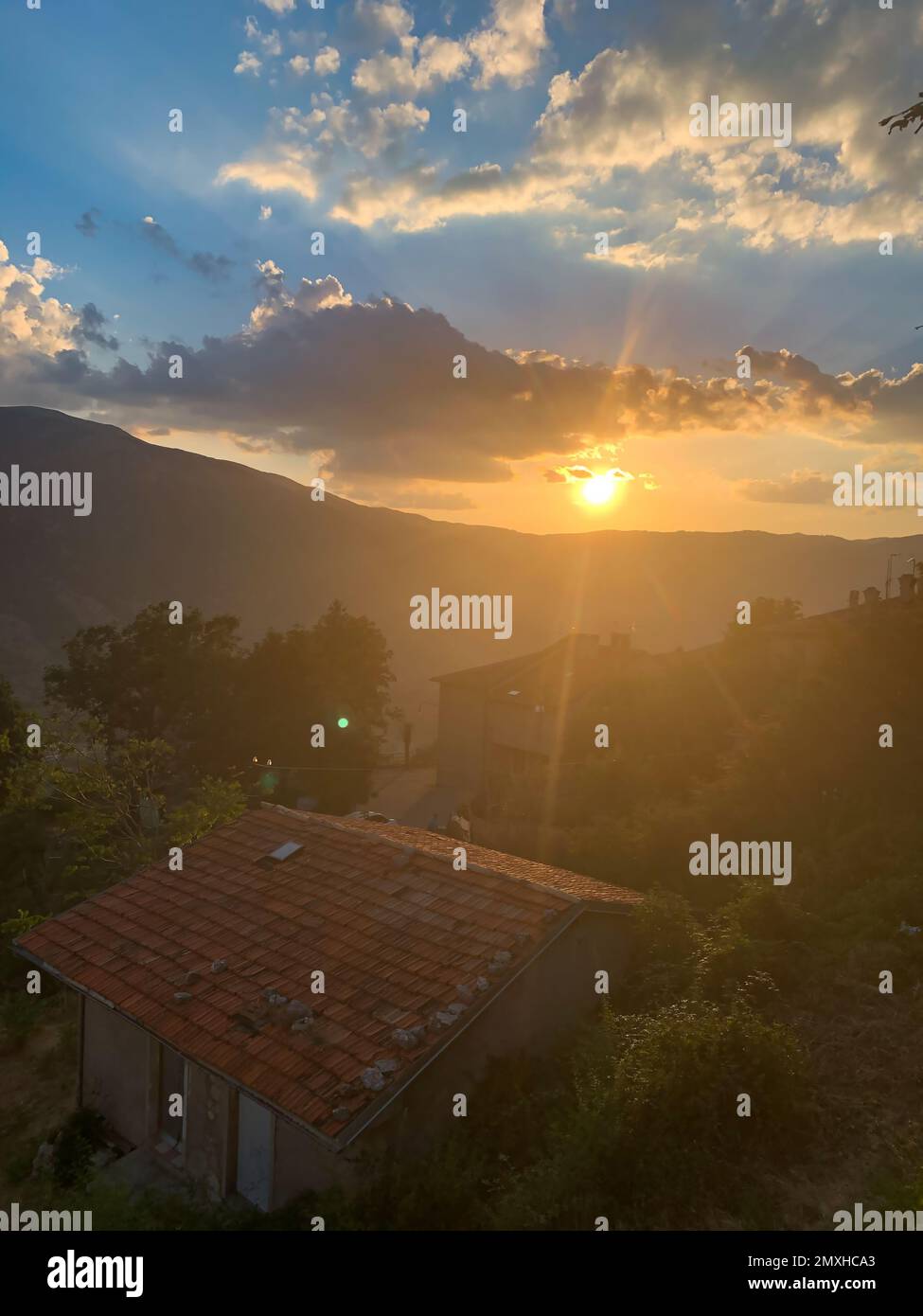 sunset in a mountain town in italy Stock Photo