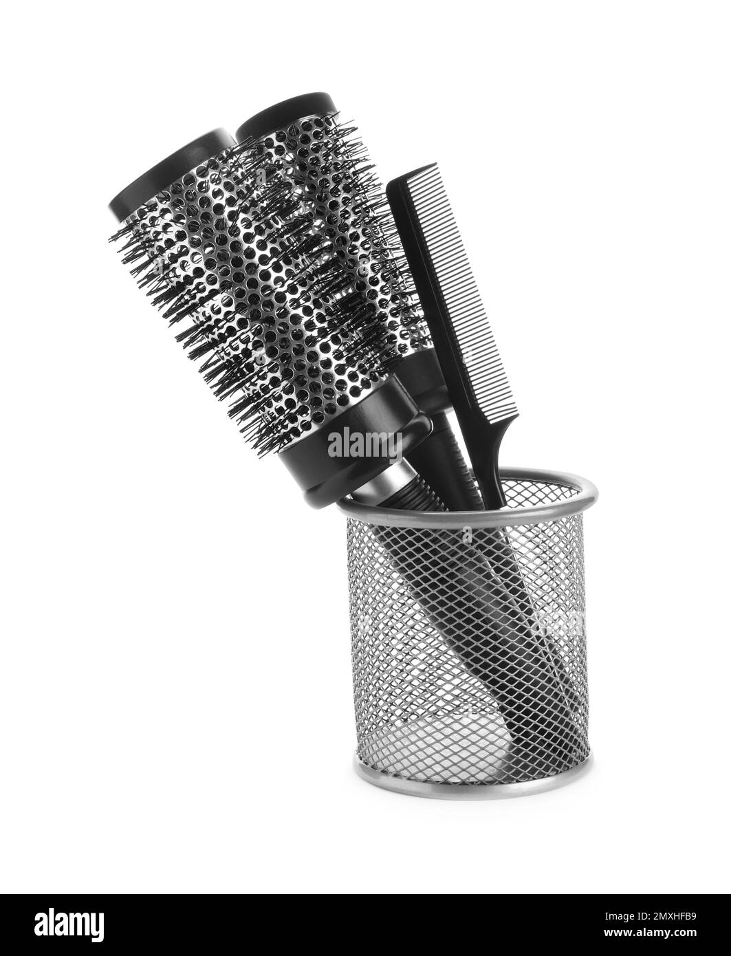 New modern hair brushes and comb in metal holder isolated on white