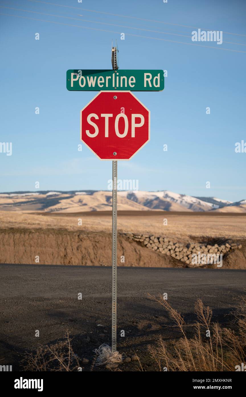 The Powerline Road with stop signal Stock Photo Alamy